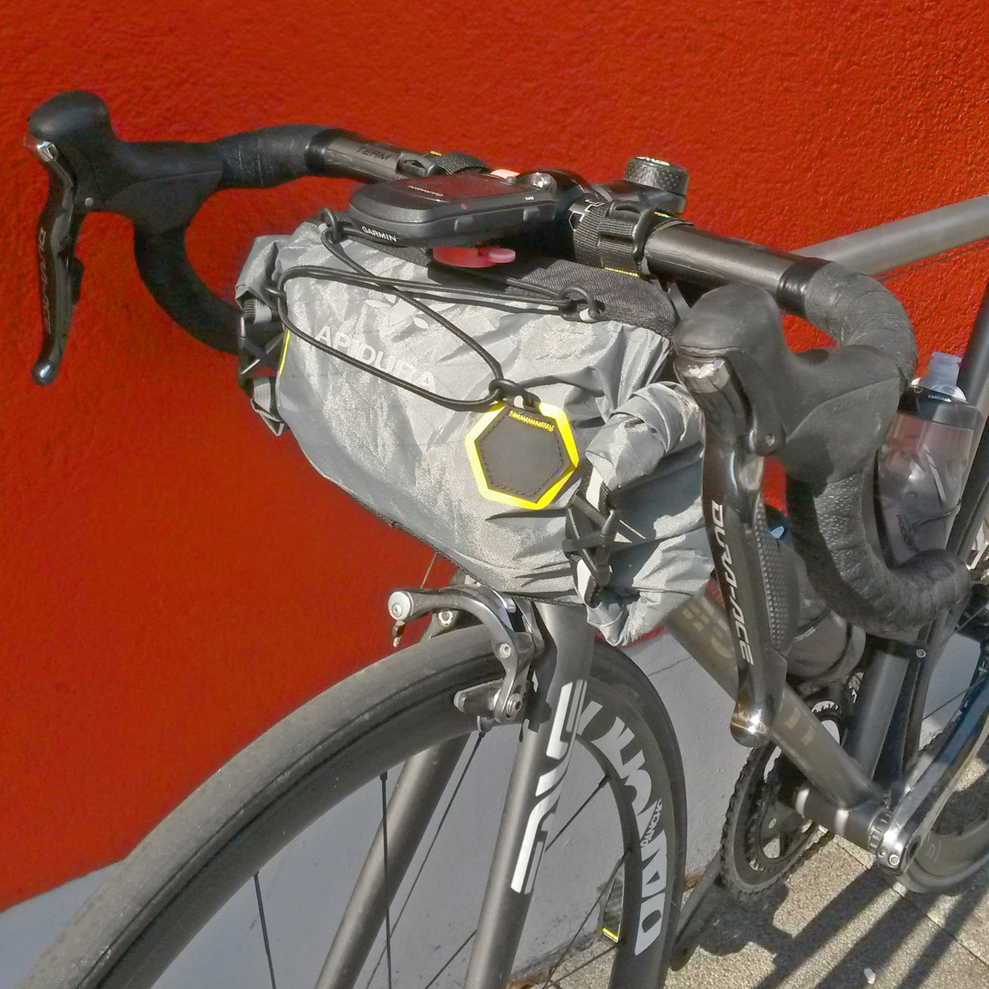 Review Apidura S Bikeng Saddle And Handlebar Packs Bikerumor Apidura Handlebar Pack Morati Red Wall