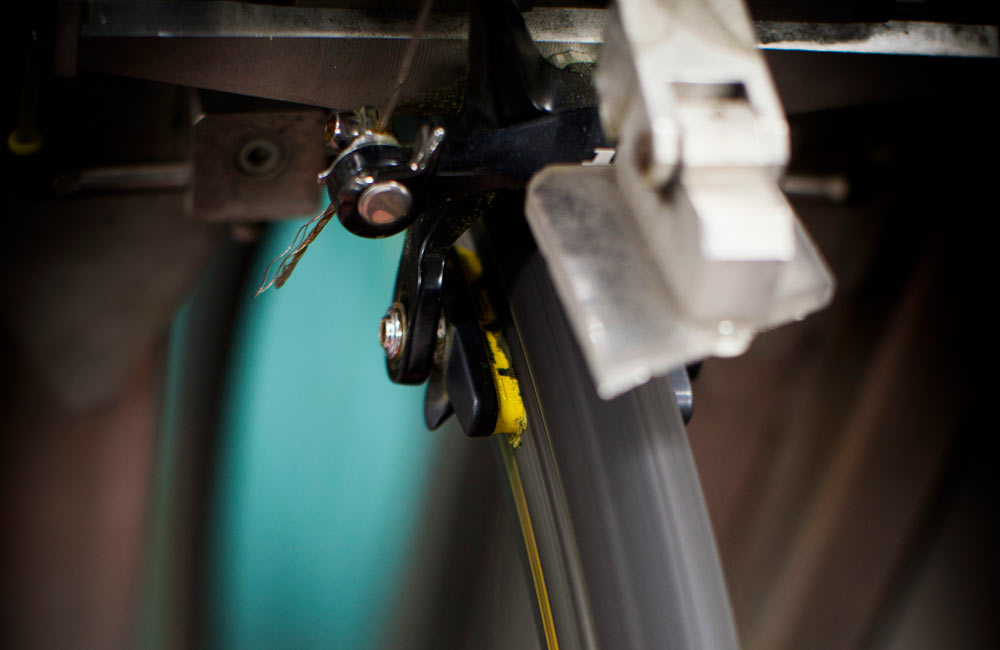 Mavic performs lab testing of braking efficiency before sending their test pilots down the Ventoux for real world testing