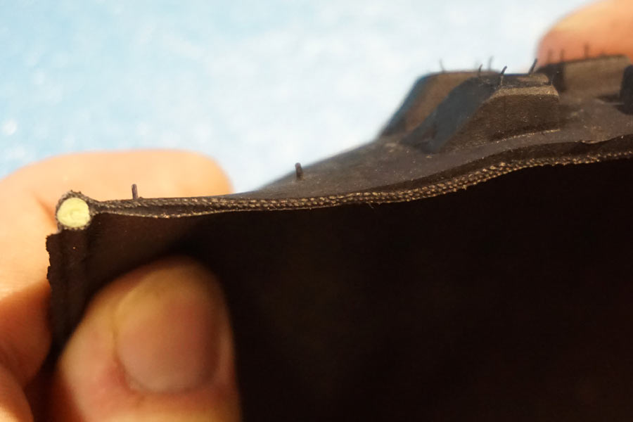 Terrene Tires tough casing cutaway to show armor layers inside a mountain bike tire sidewall